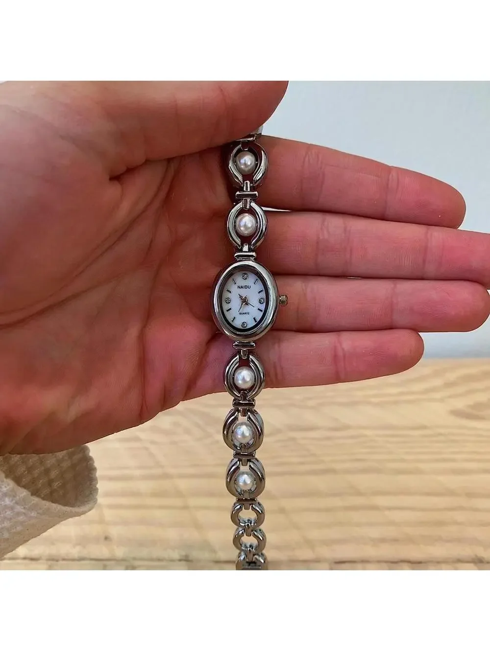 Silver round stainless steel quartz pearl stone watch
